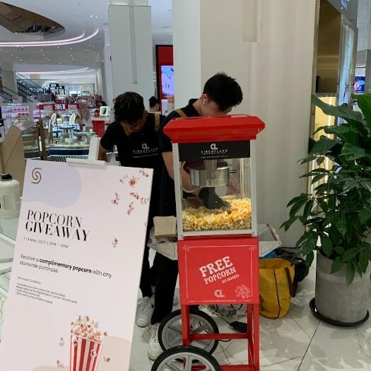 Popcorn rental service serving fresh popcorn for Seibu TRX guests. Our crews serving fresh popcorn on the spot here at Sebu TRX.