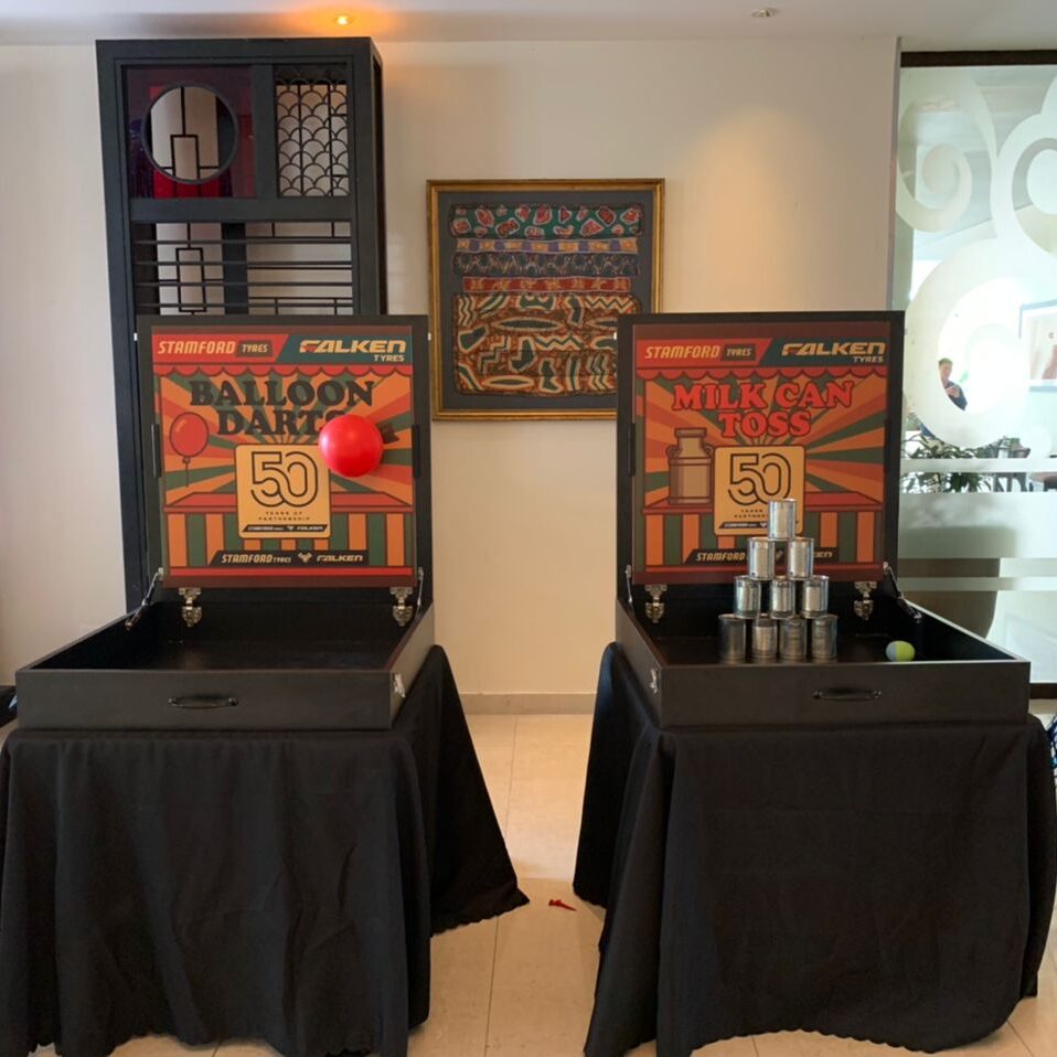 Carnival game booth rental in Malaysia for Stamford Tyres and Falken client event, creating fun engagement and interactive brand experiences.