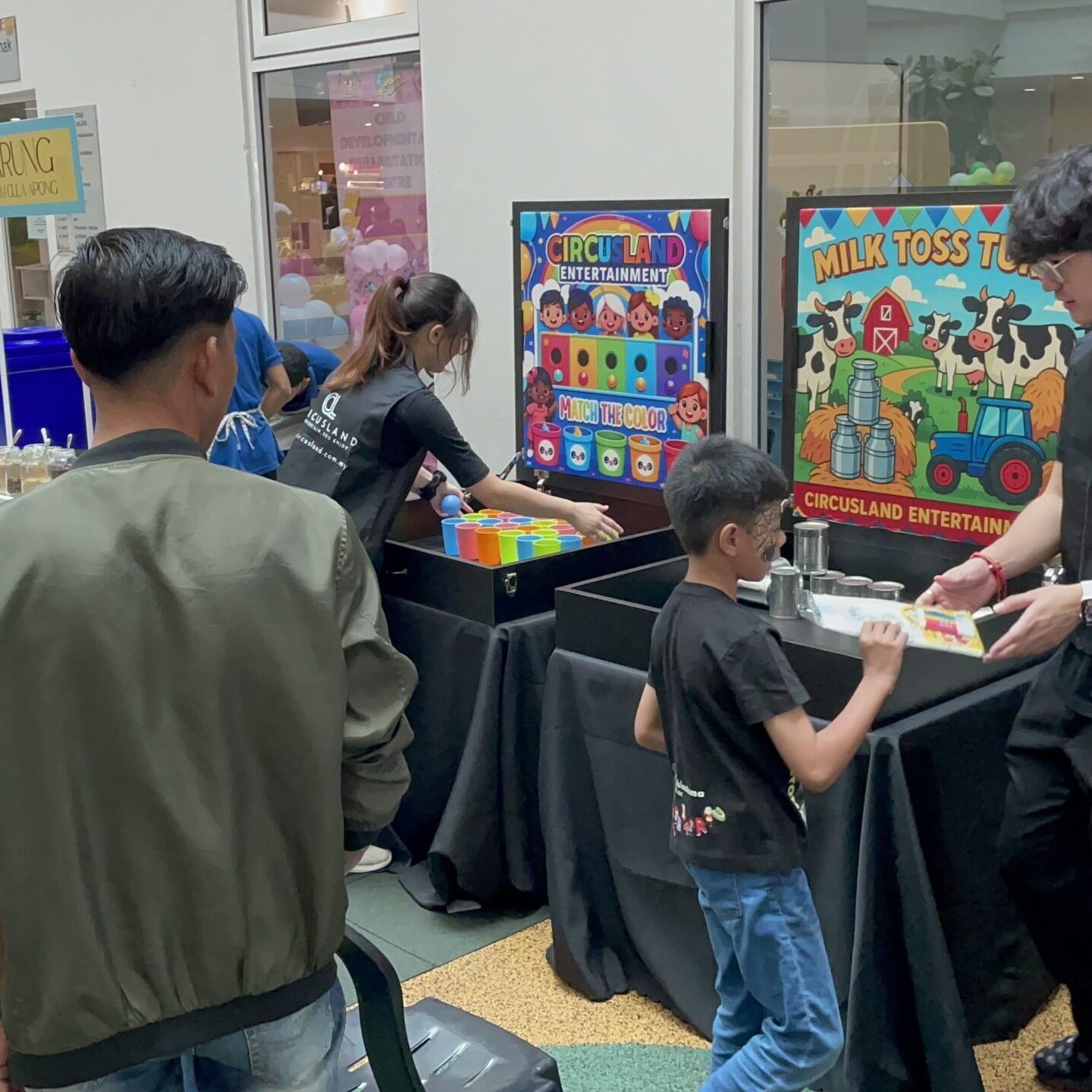 Carnival game booth rental in Malaysia during client collaboration with McDonald’s, featuring fun and engaging activities for all ages.
