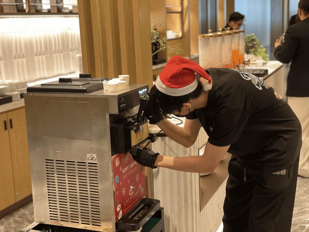 Professional soft serve ice cream rental setup for luxury hotel internal event.