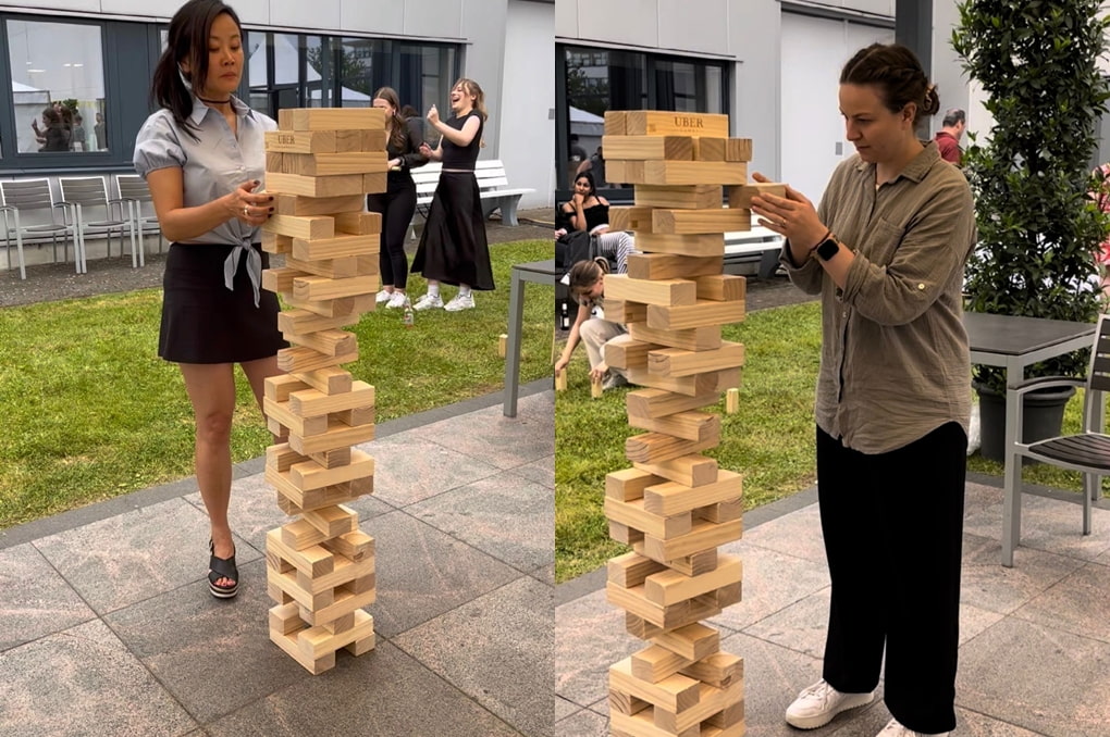 Giant Jenga rental game being played at a corporate team building event